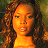 A 48x48 pixel buddy icon split into two frames showing a person with curly hair on the left and green text "OriginalIcons.com" on the right against a dark background.