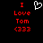 Red pixelated text 'I Love Tom (333)' appears on black background with a white heart symbol above the word 'Love'.