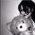 Pixelated grayscale image of a character with dark hair holding a teddy bear, featuring a small cyan square on the character's face.