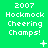 Green background with white pixelated text reading '2007 Hockmock Cheering Champs!' and small animated symbols like plus signs, stars, dots, and ellipses.