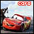Red animated car character with white eyes and a smiling mouth, emitting smoke from its hood against a blurred background.