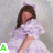 A girl in a purple dress with cat ears lies on her side, shifting pose across frames while text labels change.