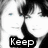 Black-and-white image of a person with dark hair, split into four quadrants displaying text fragments: Keep, My, Love, Alive.
