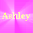 A pink gradient background with yellow text reading 'Ashley' in a pixelated font, displayed across multiple overlapping
