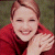 A person with short light brown hair wearing a red top, positioned next to green background text reading 'Original Icons .com'.