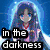 six anime-style character with overlaid text fragments forming a poem about darkness and sorrow
