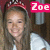 A pixelated image of a person with long brown hair wearing a red headband and white top, with pink text 'Zoe' in the upper right corner.
