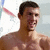 A pixelated image of a shirtless man with short dark hair smiling, positioned next to text reading "mrs. margaret phelps!" on a white background.