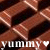 Animated sequence of chocolate bars with text 'YUMMYS' and heart symbols, showing a color shift in the hearts.