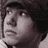 Pixelated grayscale portrait of a person with dark hair and light clothing, next to pixelated text on black background stating 'why yes. I am a Teenage Mutant Ninja Turtle.'