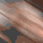Animated sequence showing a person with light brown hair transitioning from blurred motion to clear view, alongside text elements and a stamp.