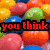 Pixelated image of colorful gumballs with overlaid text in various colors and fonts, arranged in a
