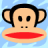Pixelated cartoon monkey face with large red lips, black hair, and light skin against a blue sky background.
