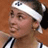 Pixelated static image of a tennis player wearing a headband and striped shirt, cropped to show upper body against brown background.