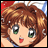 A 48x48 pixel anime-style character icon with brown hair and green eyes, paired with a black background featuring white text "Anime IM" and "COM" in stylized fonts.