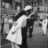 Black-and-white pixelated image with text overlay asking if a kiss will be romantic, famous, and in black & white.