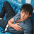 Pixelated image of a person lying on blue background with text 'zac efron is lovee <33' in black font.