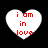 Four white heart-shaped icons with red text "i am in love" on black background, each showing different pixelation levels.