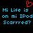 Red pixelated heart symbol above blue text reading "Mi Life is on mi IPod Scarrred?" repeated twice on black background.