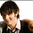 Pixelated image of a person with dark hair wearing a black jacket over a white shirt, next to green pixelated text reading "Future Mrs. Kevin Jonas" on a white background.