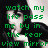 Pixelated image of a person with dark hair and black clothing, overlaid with green text reading "watch my life pass me by in the rear view mirror" on left side.