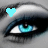 Pixelated close-up of a human eye with blue-green iris, black eyeliner, and light gray background; small cyan heart symbol in upper left corner.