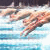 Pixelated static image of a swimmer in mid-stroke with water splashes, rendered as a 50x50 buddy icon on a transparent background.