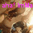 Pixelated image with pink text overlays reading 'aha! ImMa', 'Slutty', and 'Slug<3' over a blurred background of indistinct figures.