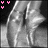 A grayscale image of a person's face with pink and white 'Y' symbols in the corners, showing animation changes across four