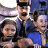 Three figures in blue uniforms with dark caps pose together, one holding a small object near the center figure's face.