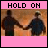 Two silhouetted figures holding hands against a warm-toned background, with pink text banners displaying 'HOLD ON' and 'Forever.'