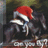 Pixelated image of a dark horse wearing a red and white Santa hat, with blue text on a bright blue background reading "God Made Horses So Girls Can Fly..." and "The Real Question Is...".
