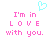 Pixelated text reads 'I'm in LOVE with you.' above a cyan heart symbol on white background.