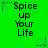 Green background with repeated text "Spice up Your Life" and purple star-shaped pixel decorations.