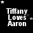 Black background with white text "Tiffany Loves Aaron" and scattered white stars in various positions