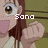Pixelated anime-style character with brown hair and large eyes, wearing a light-colored top, making a fist gesture against a green striped background.