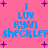 Pixelated blue text on pink background with purple stars, displaying "I LUV RYAN sheckler" in two identical vertical stacks.