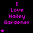 Pixelated pink text and heart symbols on black background, with animated heart sequences in different positions across frames.