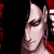 Pixelated close-up of a person's face with closed eyes, dark hair, and red accents on the right side against black background.