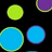 Pixelated circles in green, blue, and purple float against black background with pink text reading 'Reak is my middle name.'