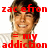 Pixelated image of a smiling person with brown hair wearing a light-colored shirt, overlaid with red text reading "zac efron = my addiction".