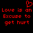 Red pixelated text on black background reads "Love is an Excuse to get hurt" with a red heart symbol above the first line.
