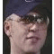 Animated sequence showing a person in multiple poses with changing text labels, wearing dark sunglasses and a blue cap.
