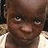 A composite image with a child's face, multiple text fragments including 'Because he needs your money', 'more than', and 'Save Darfur' in black and red fonts.