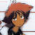 Pixelated anime-style character with dark hair and orange skin wears a large red hat, facing left with a neutral expression.