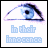 A pixelated eye with blue iris and black pupil appears above light blue text reading "in their innocence" on a white background.