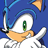Pixelated close-up of a blue anthropomorphic hedgehog with green eyes, orange muzzle, and white gloves against a solid blue background.