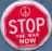 Two identical red octagonal stop sign icons with white text and border, side-by-side on a blue background.