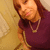 A person in a purple top and necklace appears across four with slight variations in head position and background elements