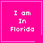 Four identical pink squares with white text "I am In Florida" and one square containing a small heart symbol.